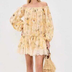 Zimmerman yellow strapless long-sleeved short dress.